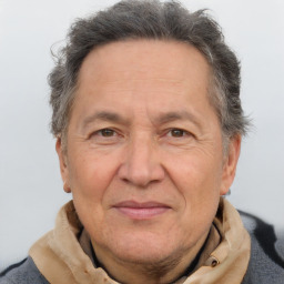 Joyful white middle-aged male with short  brown hair and brown eyes