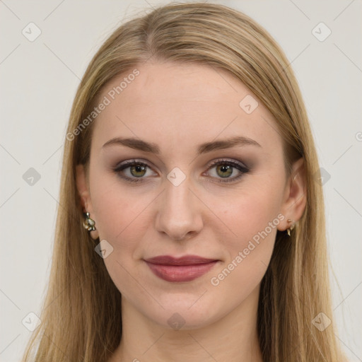 Joyful white young-adult female with long  brown hair and green eyes