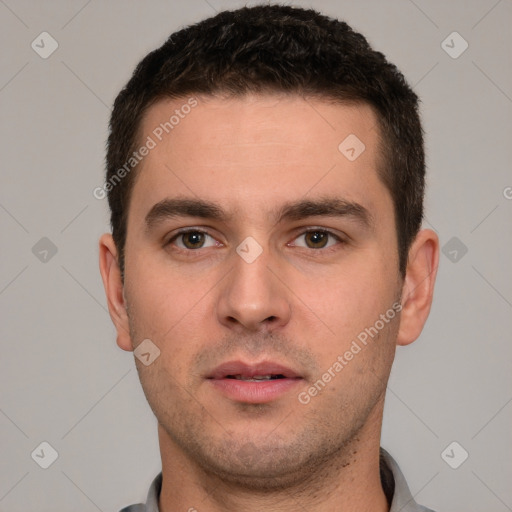 Neutral white young-adult male with short  brown hair and brown eyes