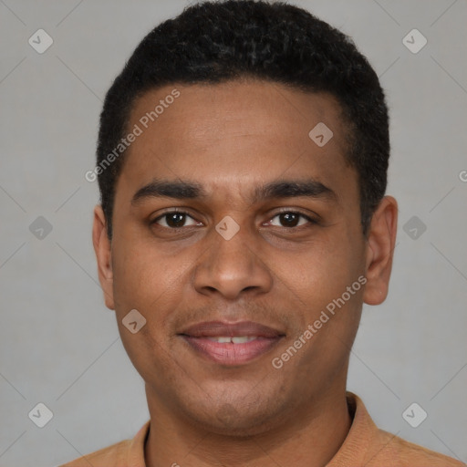 Joyful black young-adult male with short  black hair and brown eyes