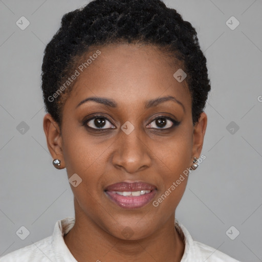 Joyful black young-adult female with short  brown hair and brown eyes