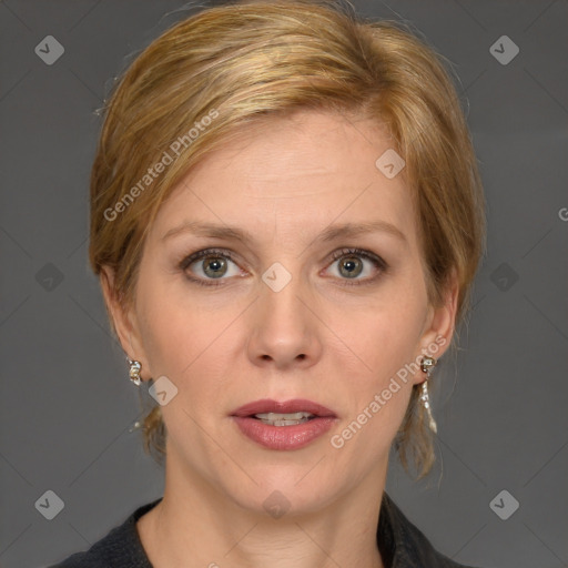 Joyful white adult female with medium  brown hair and grey eyes