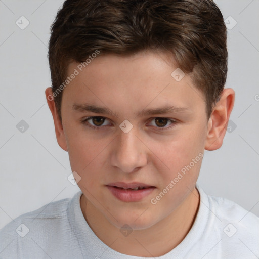 Joyful white child male with short  brown hair and brown eyes