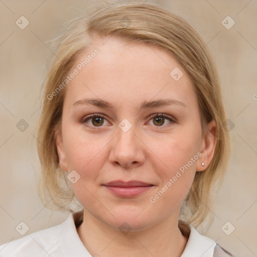 Joyful white young-adult female with medium  brown hair and blue eyes