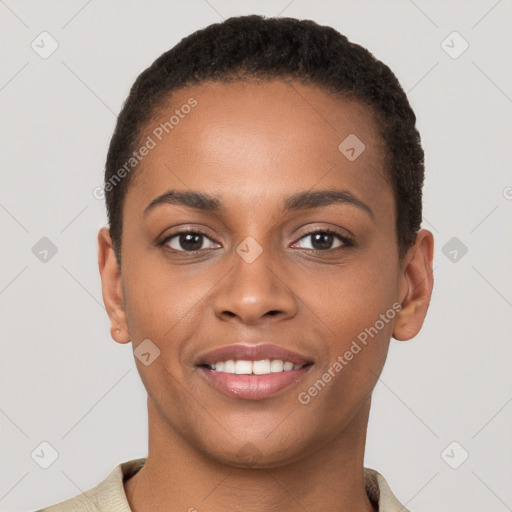 Joyful black young-adult female with short  brown hair and brown eyes