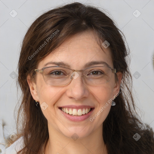 Joyful white adult female with long  brown hair and brown eyes