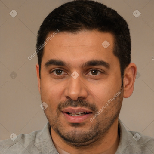 Joyful white young-adult male with short  black hair and brown eyes