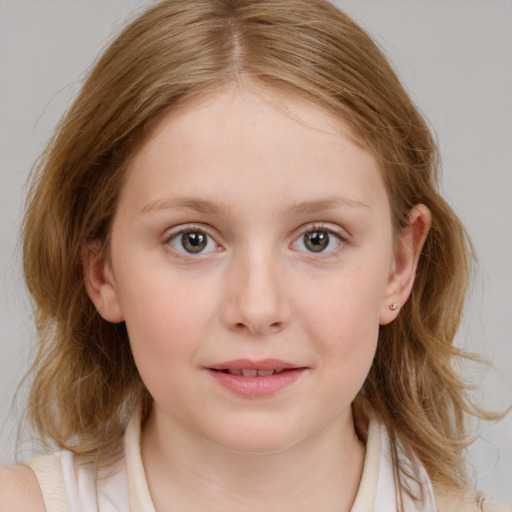 Joyful white child female with medium  brown hair and blue eyes