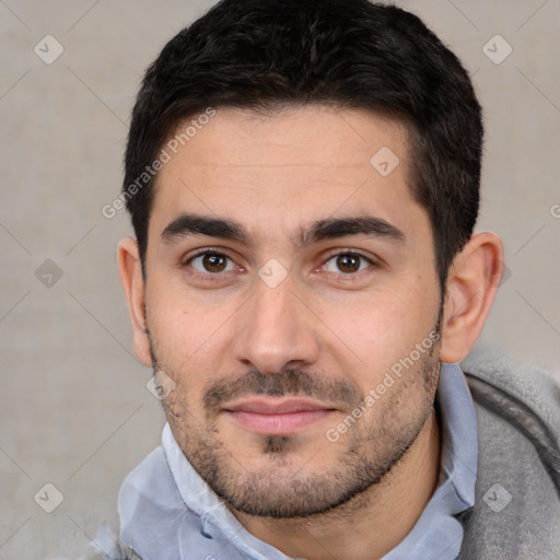 Joyful white young-adult male with short  black hair and brown eyes