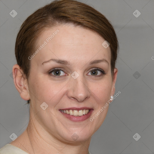 Joyful white young-adult female with short  brown hair and grey eyes