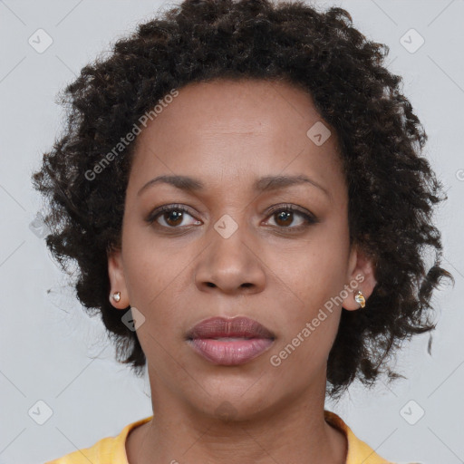 Neutral black young-adult female with short  brown hair and brown eyes