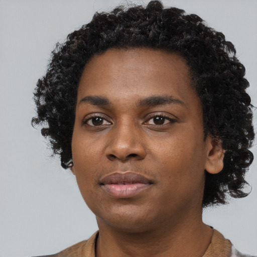 Neutral black young-adult female with short  black hair and brown eyes