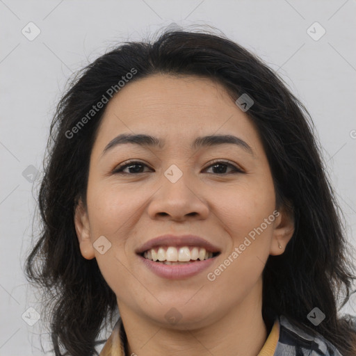 Joyful asian young-adult female with long  brown hair and brown eyes