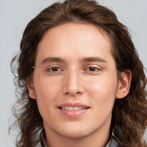 Joyful white young-adult male with medium  brown hair and brown eyes