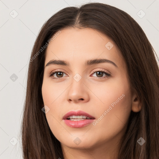 Neutral white young-adult female with long  brown hair and brown eyes