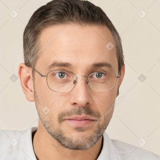 Neutral white adult male with short  brown hair and brown eyes