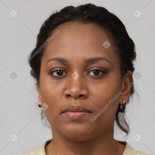 Neutral black young-adult female with short  brown hair and brown eyes