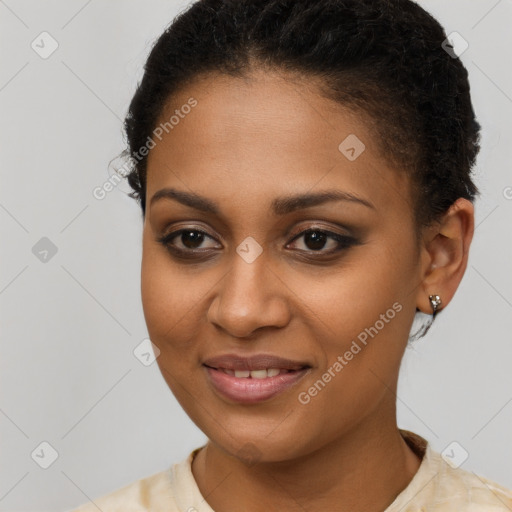 Joyful black young-adult female with short  brown hair and brown eyes