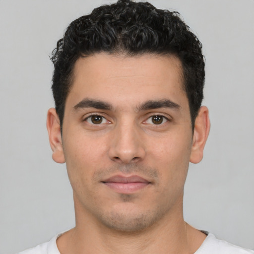 Neutral white young-adult male with short  black hair and brown eyes