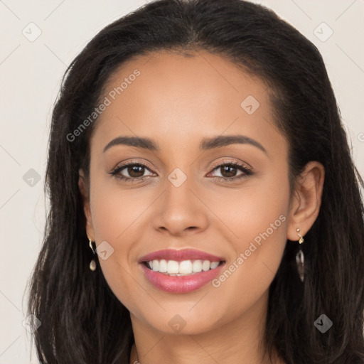 Joyful latino young-adult female with long  brown hair and brown eyes