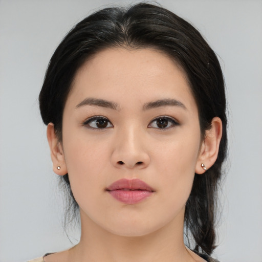 Neutral asian young-adult female with medium  black hair and brown eyes