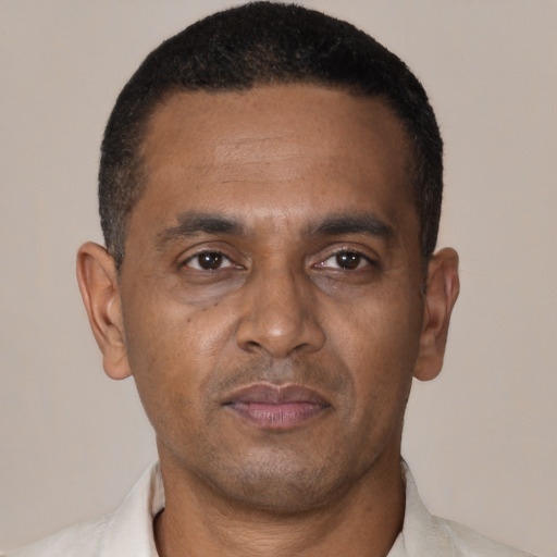 Neutral black young-adult male with short  brown hair and brown eyes