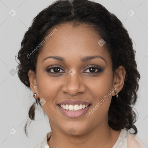 Joyful black young-adult female with medium  brown hair and brown eyes