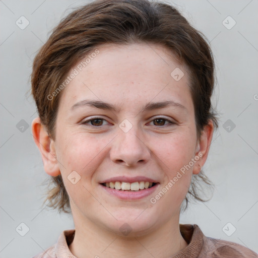 Joyful white young-adult female with medium  brown hair and blue eyes