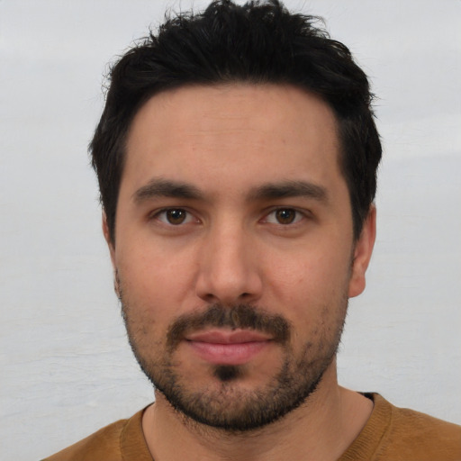 Neutral white young-adult male with short  black hair and brown eyes