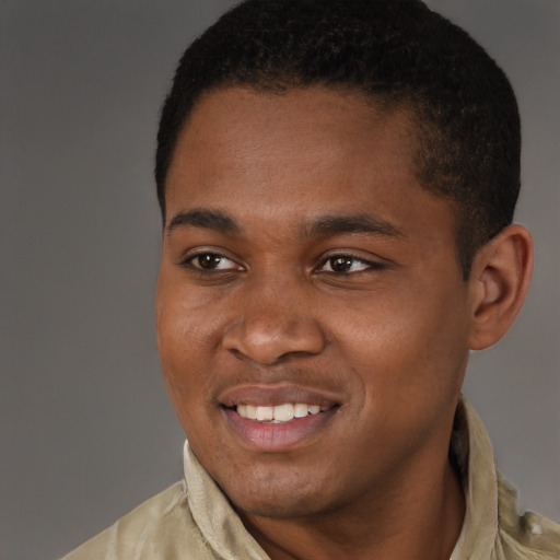 Joyful latino young-adult male with short  brown hair and brown eyes