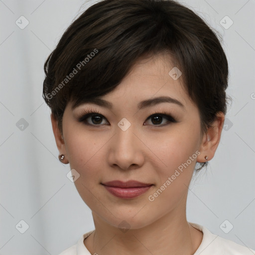 Joyful asian young-adult female with short  brown hair and brown eyes