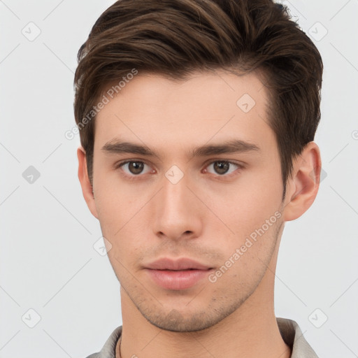 Neutral white young-adult male with short  brown hair and brown eyes