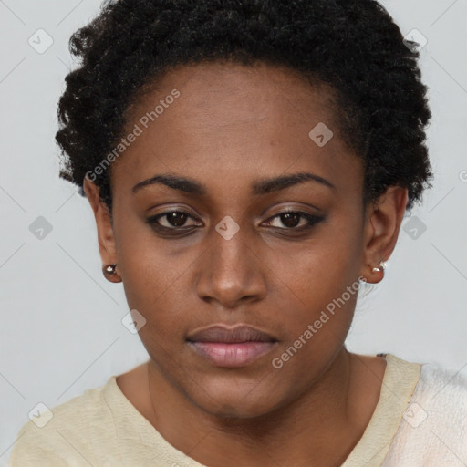 Neutral black young-adult female with short  brown hair and brown eyes