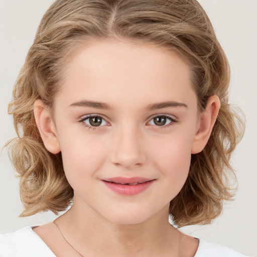 Joyful white child female with medium  brown hair and brown eyes