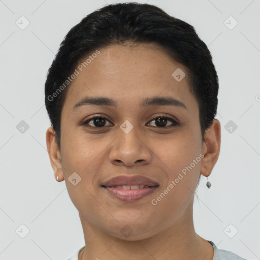 Joyful latino young-adult female with short  black hair and brown eyes