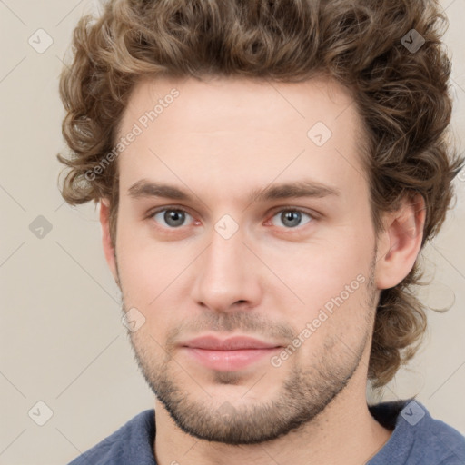 Neutral white young-adult male with short  brown hair and grey eyes