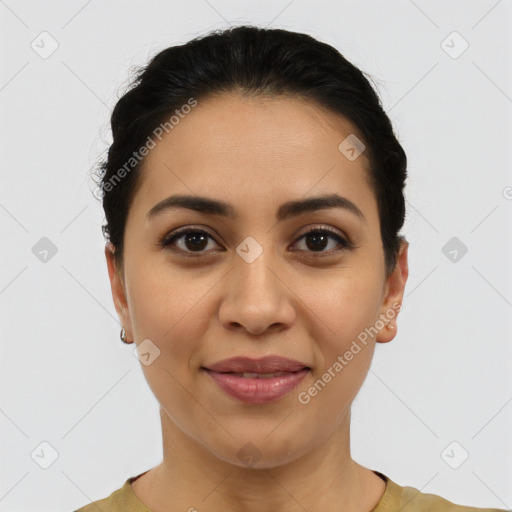 Joyful latino young-adult female with short  brown hair and brown eyes