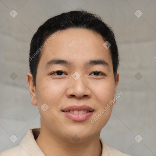 Joyful asian young-adult male with short  brown hair and brown eyes