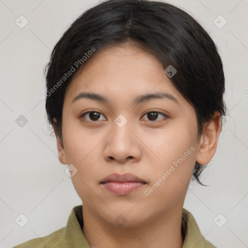 Neutral asian young-adult female with medium  brown hair and brown eyes