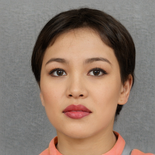 Neutral asian young-adult female with short  brown hair and brown eyes