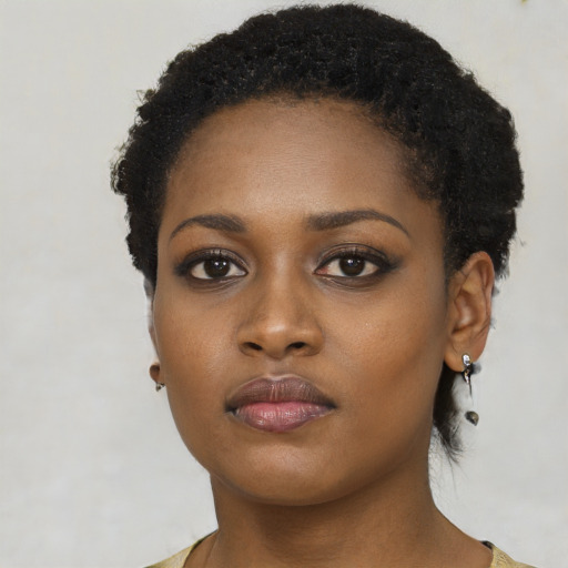 Neutral black young-adult female with short  black hair and brown eyes