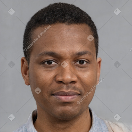 Joyful latino young-adult male with short  brown hair and brown eyes