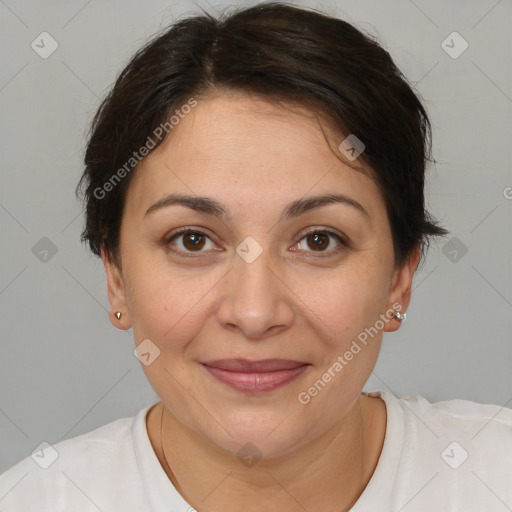 Joyful white adult female with short  brown hair and brown eyes