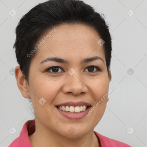 Joyful latino young-adult female with short  brown hair and brown eyes