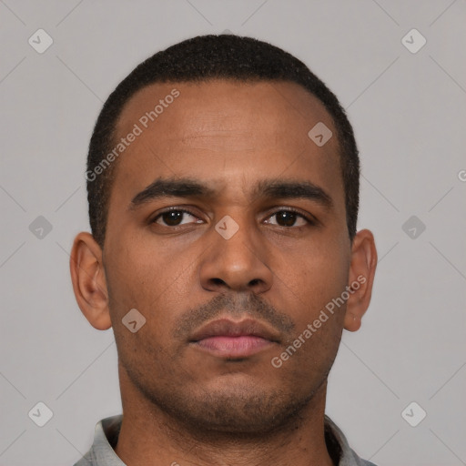 Neutral latino young-adult male with short  brown hair and brown eyes