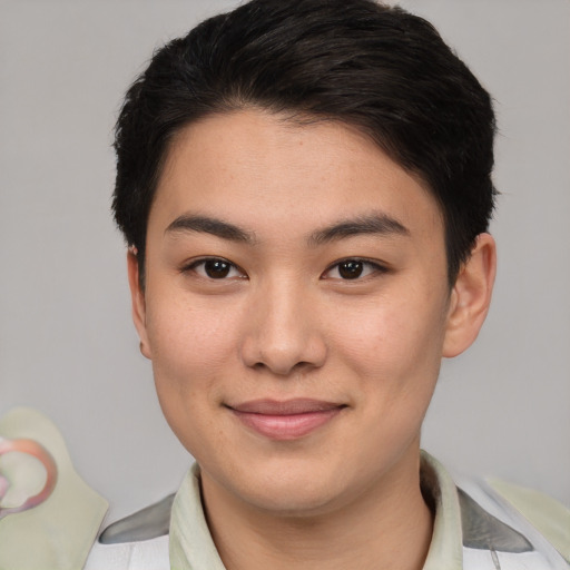 Joyful asian young-adult female with short  brown hair and brown eyes