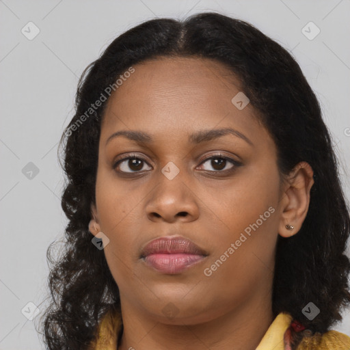 Neutral black young-adult female with long  brown hair and brown eyes