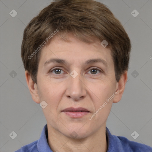 Joyful white adult male with short  brown hair and grey eyes