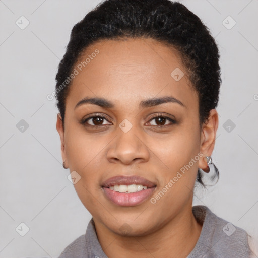 Joyful latino young-adult female with short  black hair and brown eyes