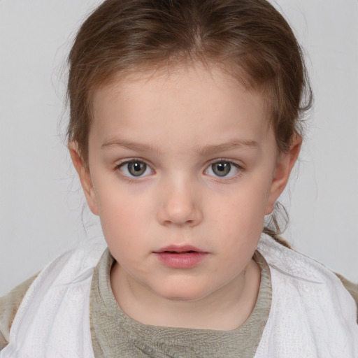 Neutral white child female with medium  brown hair and brown eyes